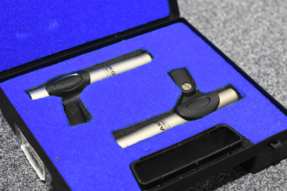 Two AKG D160 condenser microphones in their case